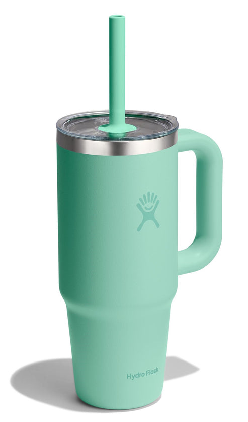 Mint green insulated tumbler with handle and straw.
