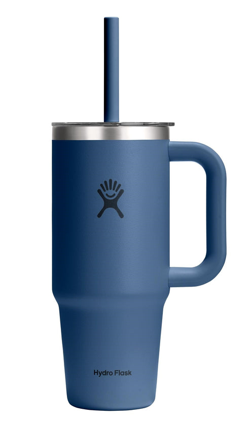 Blue stainless steel tumbler with handle, straw, and visible logo.