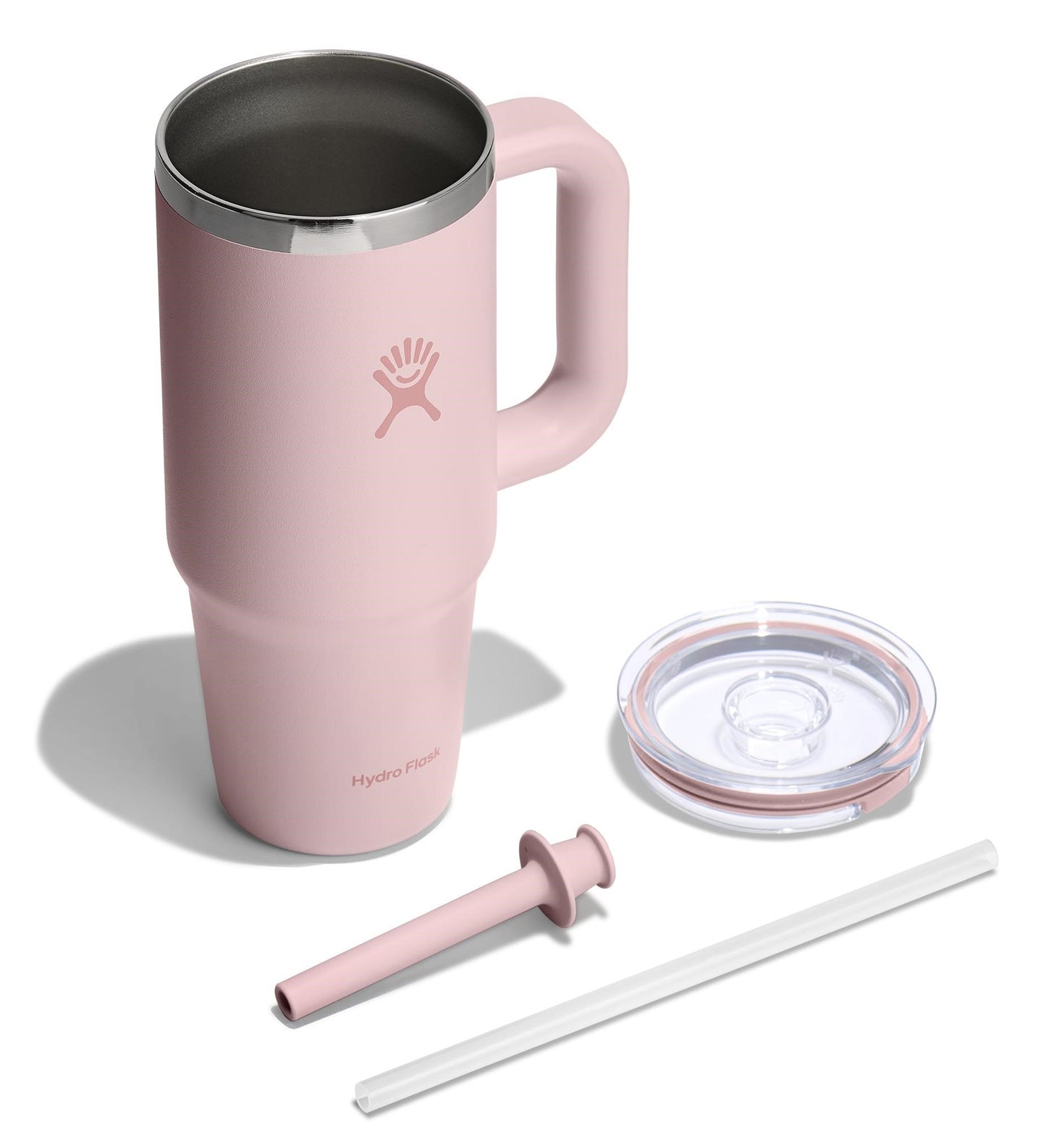 Pink stainless steel mug with handle, lid, straw, and straw cleaner.
