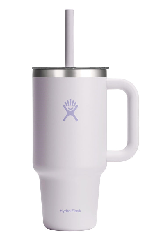 White travel tumbler with handle and straw; the brand logo is in light purple; text at the bottom reads: Hydro Flask.