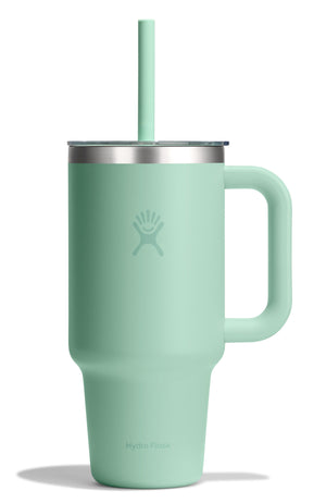 Insulated light green mug with handle, metal lid, and straw.