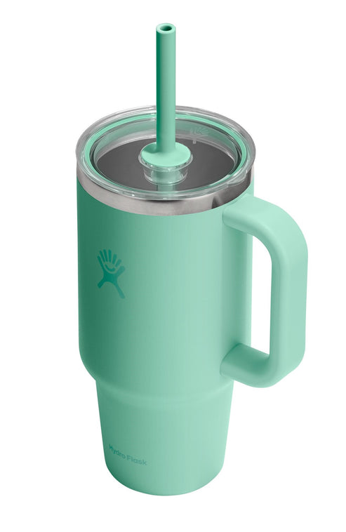 Teal cup with handle, clear lid, and straw.