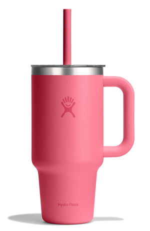 Pink metal insulated mug with a handle, a lid, and a straw.