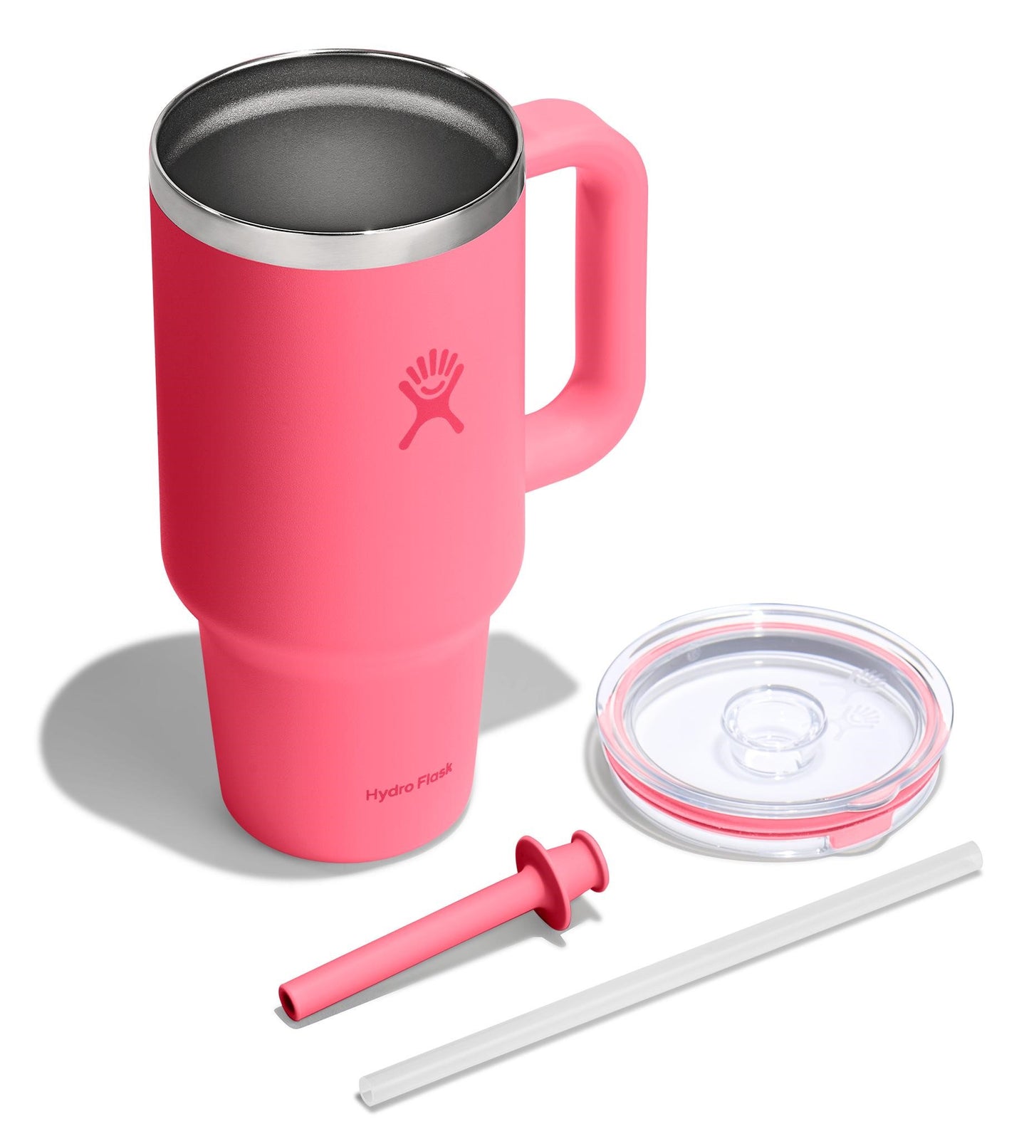 Pink mug with handle, metal interior, a clear lid, a pink straw and a white straw.