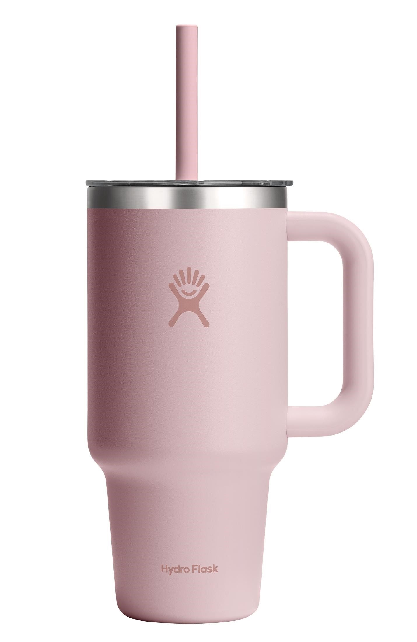 Light pink insulated tumbler with handle and straw.