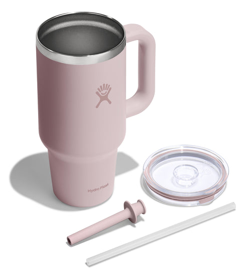 Insulated stainless steel cup with handle, lid, straw, and straw cleaner.