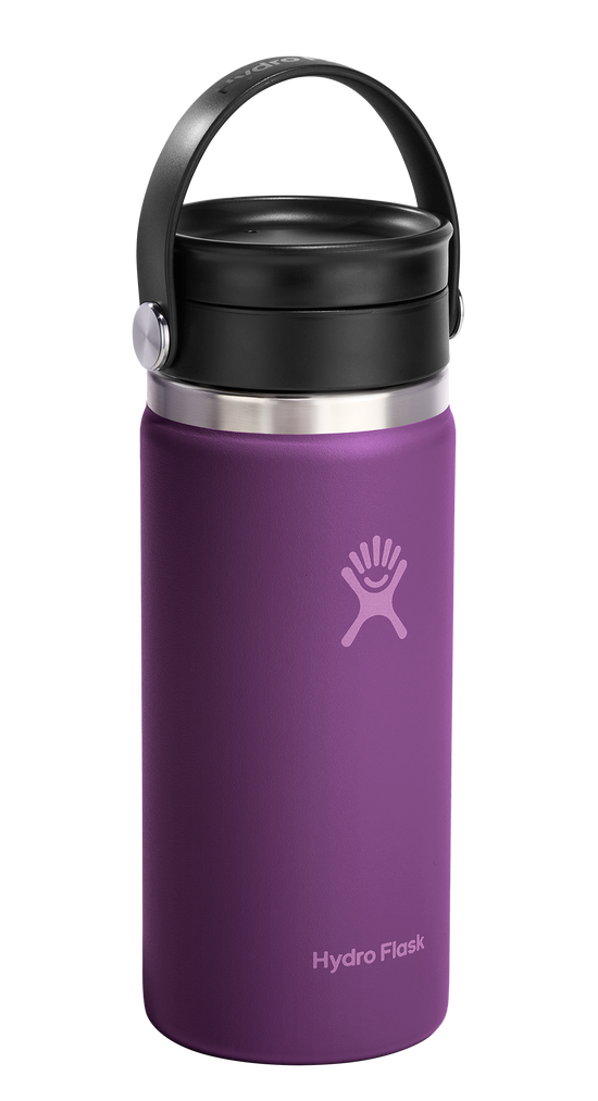 A short, cylindrical, purple bottle with a black lid and handle.