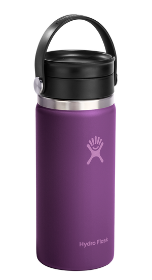 A short, cylindrical, purple bottle with a black lid and handle.