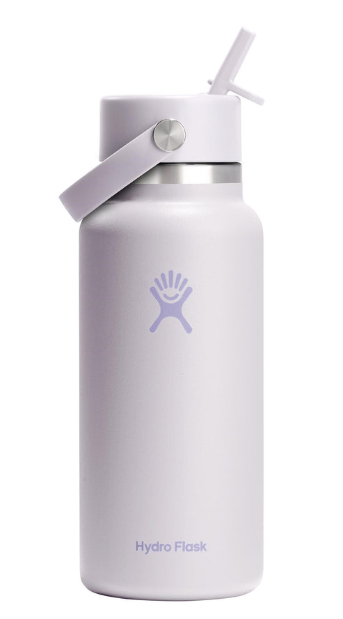 Lavender-colored metal water bottle with a straw lid and handle. Hydro Flask logo and brand name are visible at the bottom.