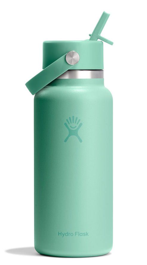 Mint green Hydro Flask bottle with straw lid and handle.