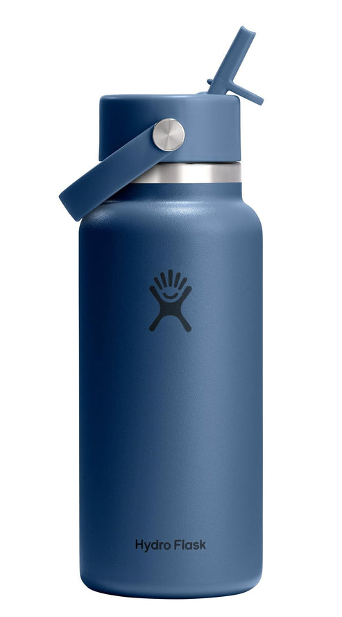 Navy blue water bottle with straw lid.