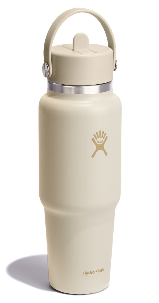Beige insulated water bottle with lid and handle.