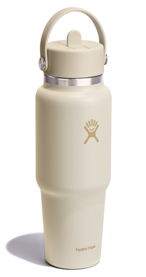 Beige insulated water bottle with lid and handle.
