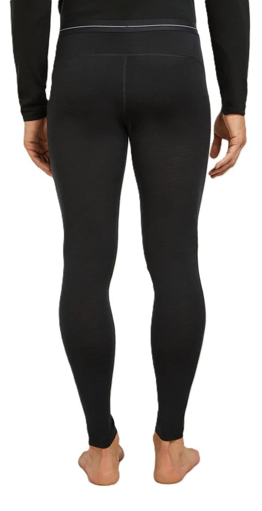 Person wearing black thermal leggings, rear view.