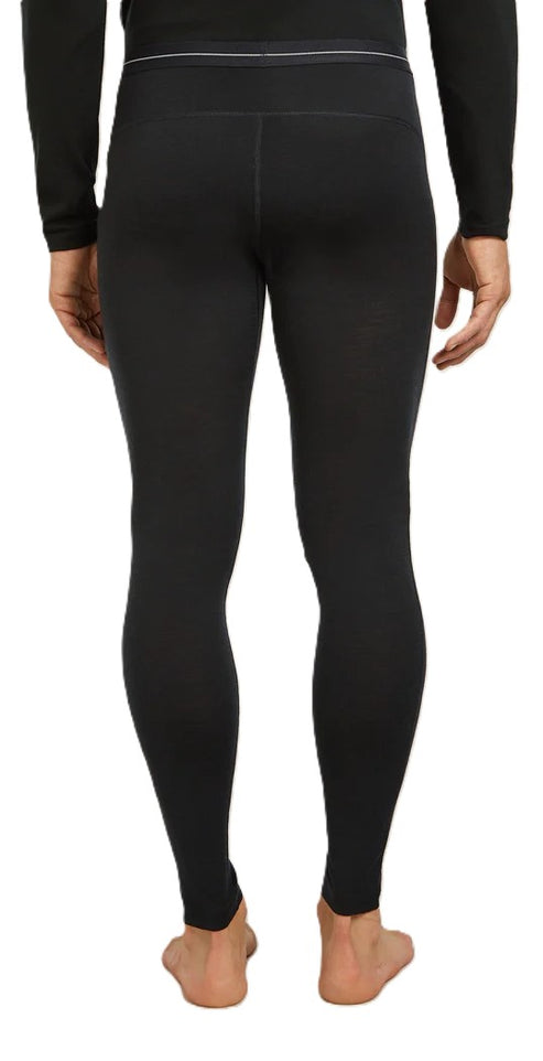 Person wearing black thermal leggings, rear view.