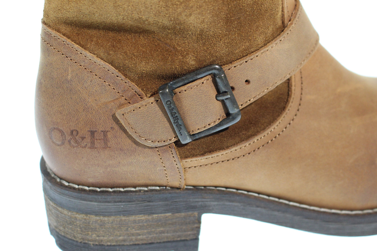 Tan leather and suede boot with black metal buckle and decorative strap