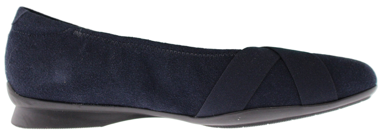 Navy blue suede-like ballet flat with crossed elastic straps.