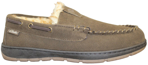 A moccasin style slipper with faux fur lining and visible Clarks logo.
