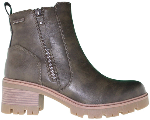 Olive-green ankle boot with block heel, side zipper, and lug sole.