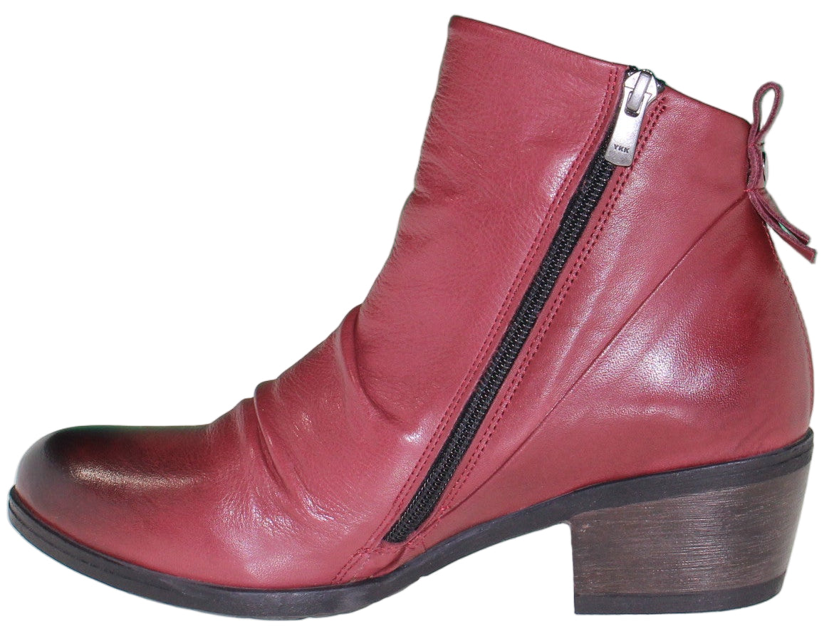 Red leather ankle boot with side zipper and stacked heel.