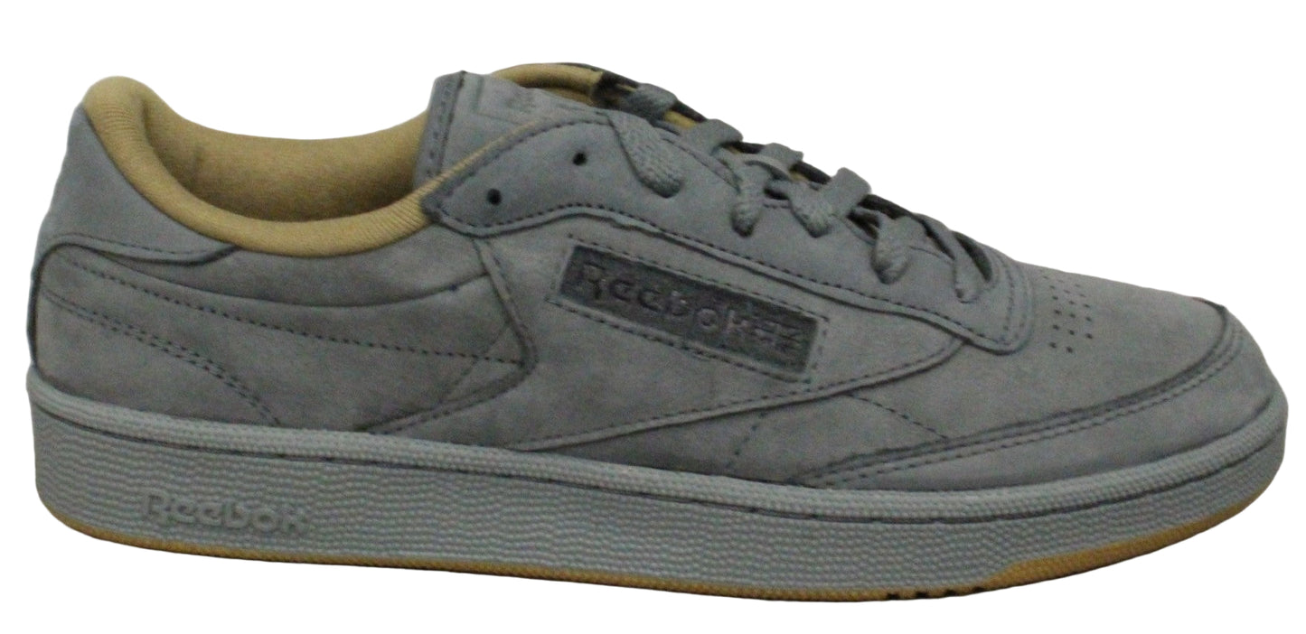 A grey sneaker with a tan interior.