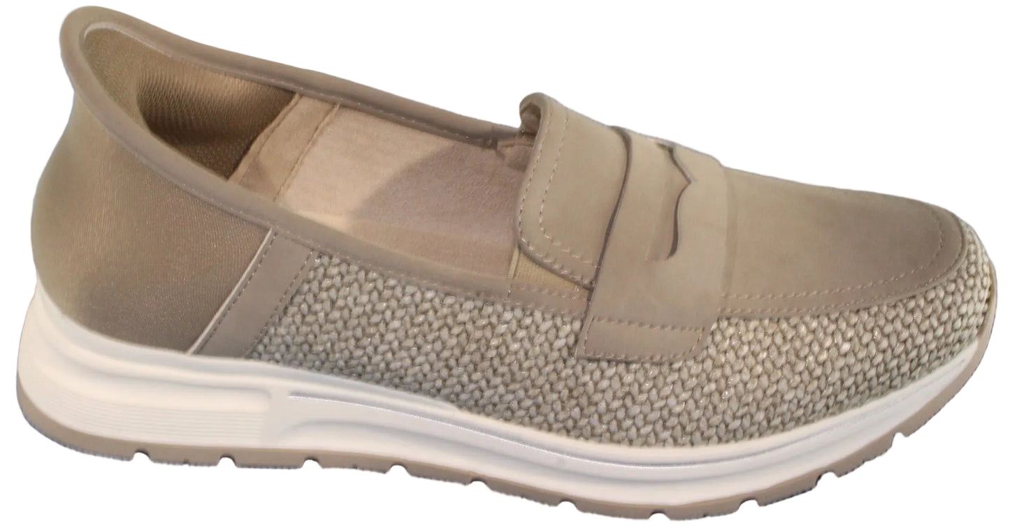 A women's beige loafer with braided details and a thick white sole.