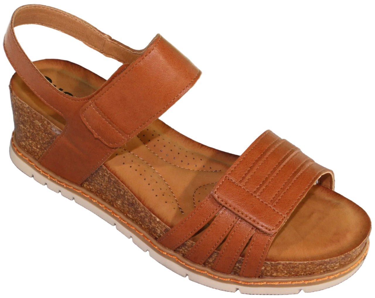 Tan leather sandal with adjustable straps, cork wedge heel and white sole.