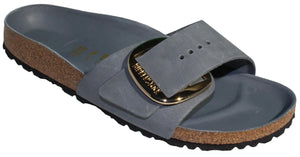 Blue slide sandal with a gold buckle.