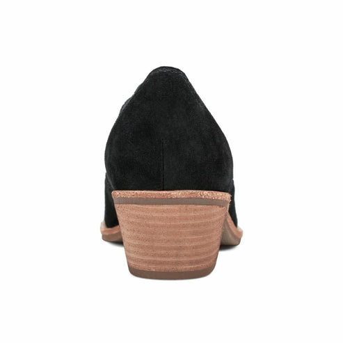 Rear view of a black suede heeled loafer.