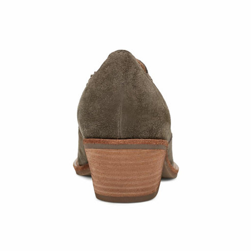 Rear view of a grey suede ankle boot with a stacked wooden heel.