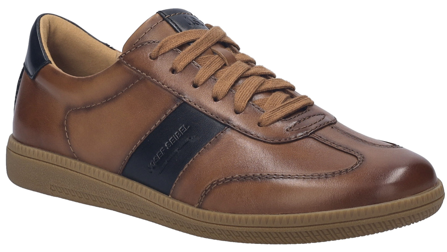 A brown leather shoe with a dark blue stripe and laces.