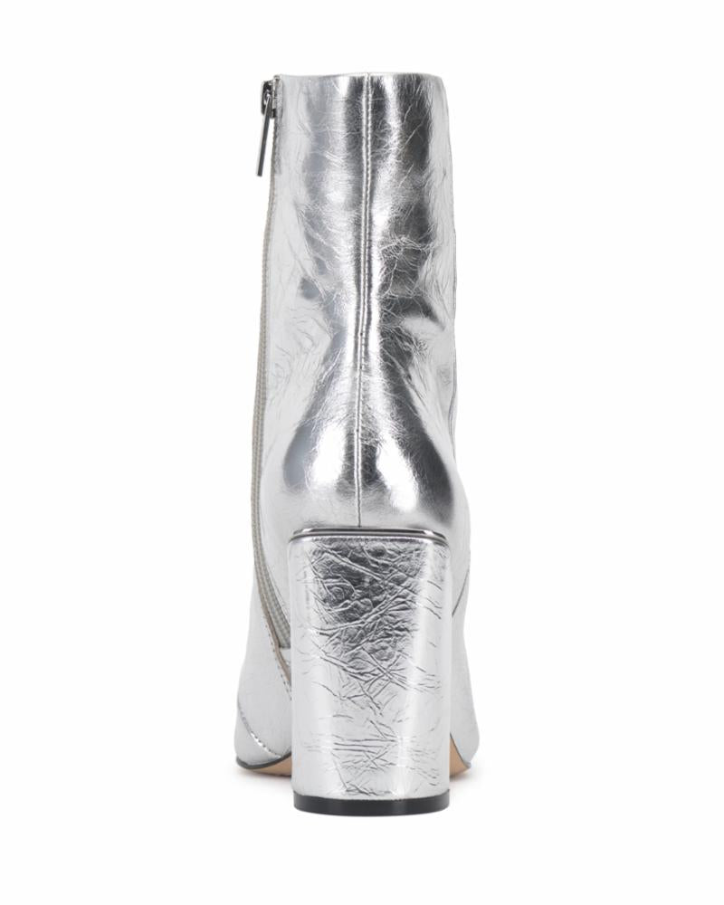Rear view of a silver ankle boot with a chunky block heel and a side zipper.
