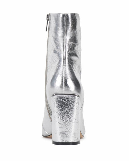 Rear view of a silver ankle boot with a chunky block heel and a side zipper.