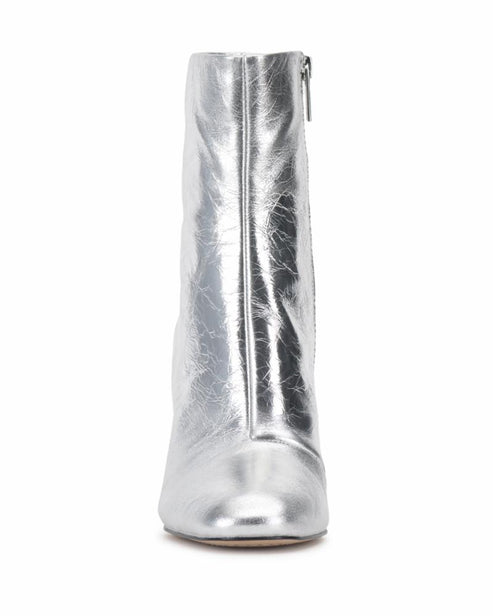 Metallic silver ankle boot with block heel and side zipper.