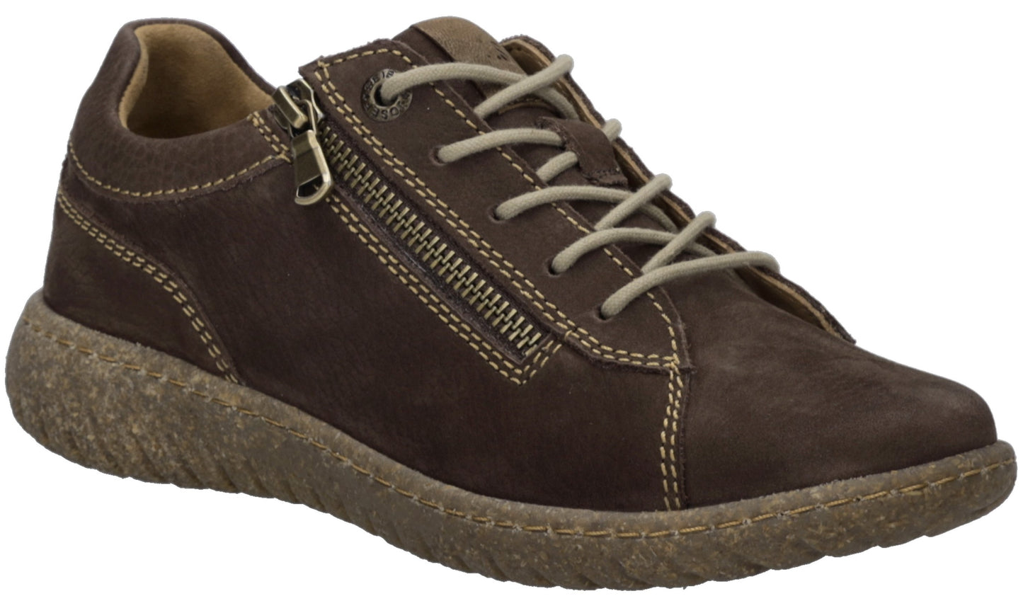 A brown suede sneaker with a side zipper, beige laces, visible stitching details, and a textured, tan-colored rubber sole.