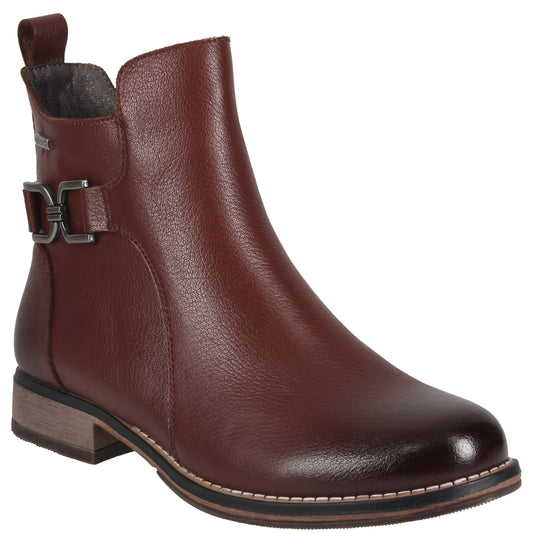A brown leather ankle boot with a low block heel, a rounded toe, and a decorative metallic buckle on the side.