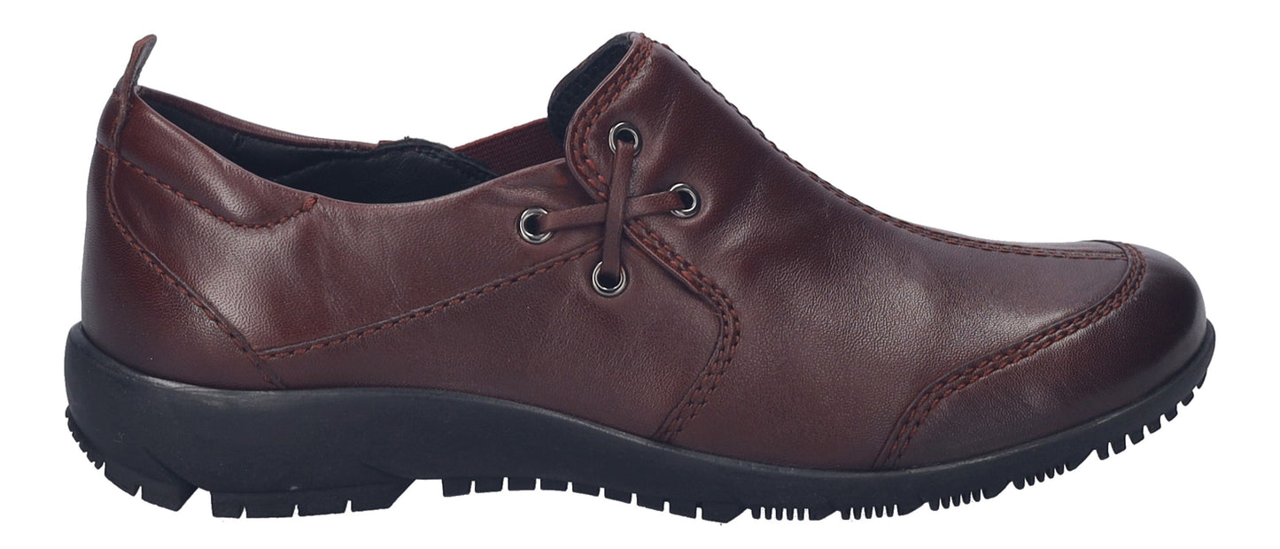 A low-profile dark brown shoe with decorative lacing.