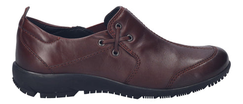 A low-profile dark brown shoe with decorative lacing.