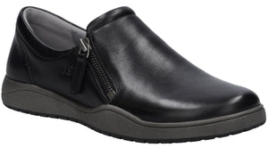 A black leather slip-on shoe with a side zipper and a grey rubber sole against a white background.