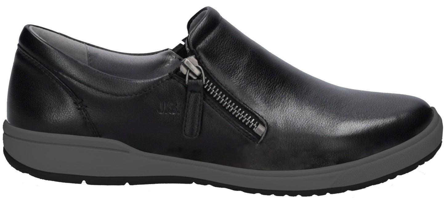 A black leather slip-on shoe with a side zipper closure, a grey sole, and a black bottom tread.