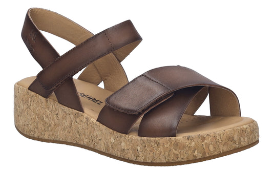 A dark brown sandal with a cork platform.