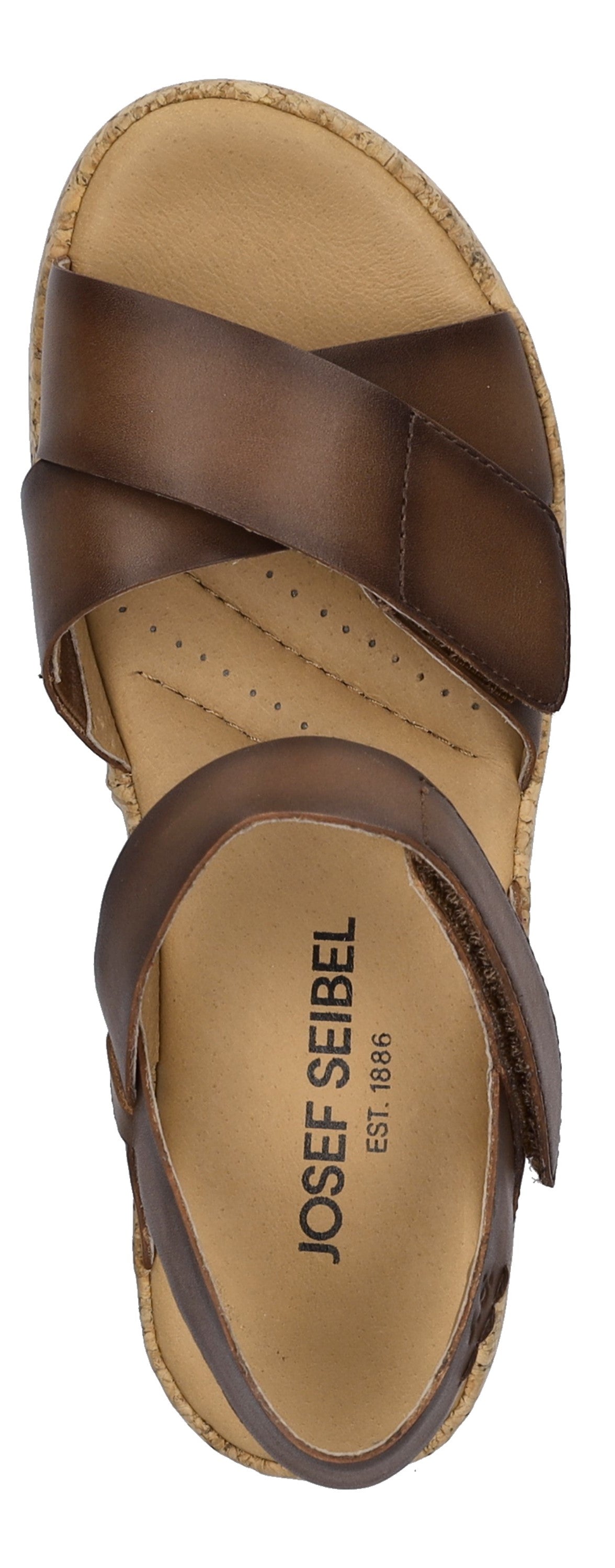 A brown leather sandal with criss-cross straps and an adjustable ankle strap. Visible text reads: "JOSEF SEIBEL EST 1886".