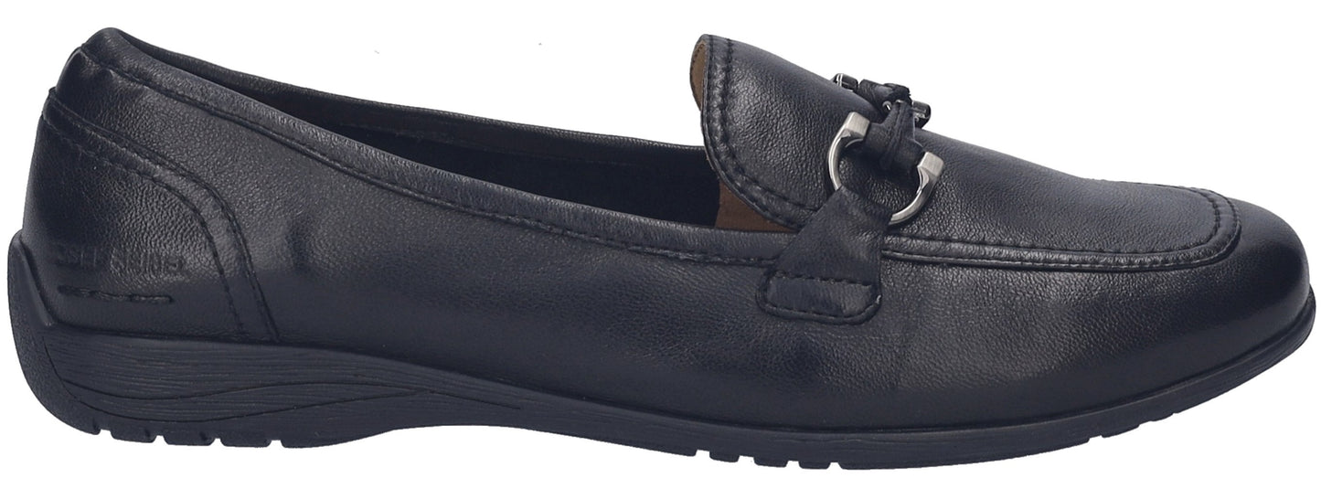A black leather loafer shoe with a silver bit detail across the vamp, sitting on a low, textured rubber sole.