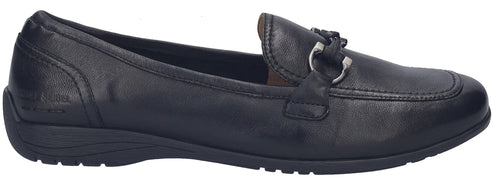 A black leather loafer shoe with a silver bit detail across the vamp, sitting on a low, textured rubber sole.