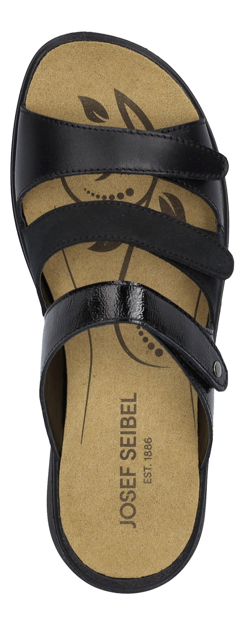 A sandal with black straps and adjustable closures.