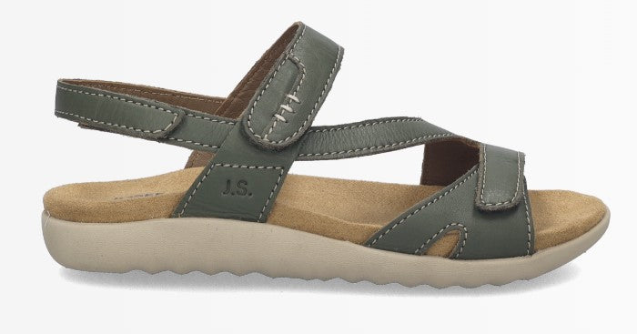 Olive green leather sandal with hook and loop straps and a light brown sole; "J.S." is printed on the sandal.