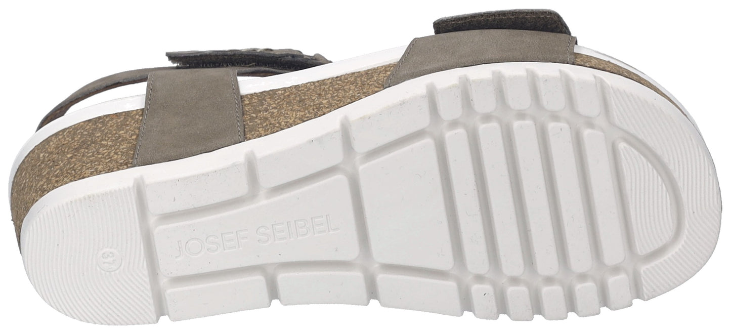 The shoe sole is white with a brown mid-sole, attached to a sandal with grey straps.