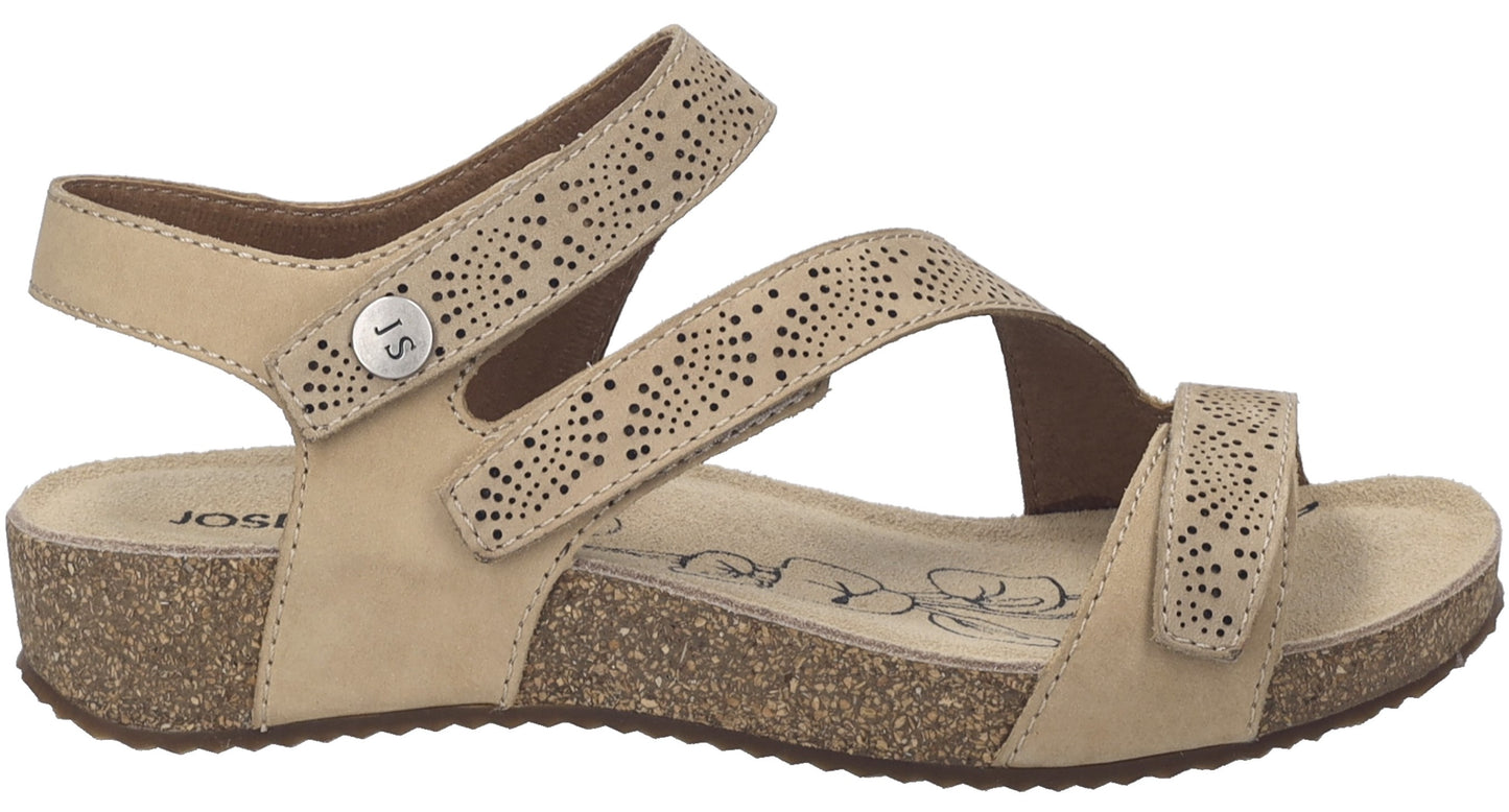 Beige sandal with three hook and loop straps.