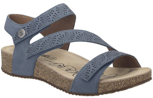 Blue sandal with patterned straps and a cork sole.