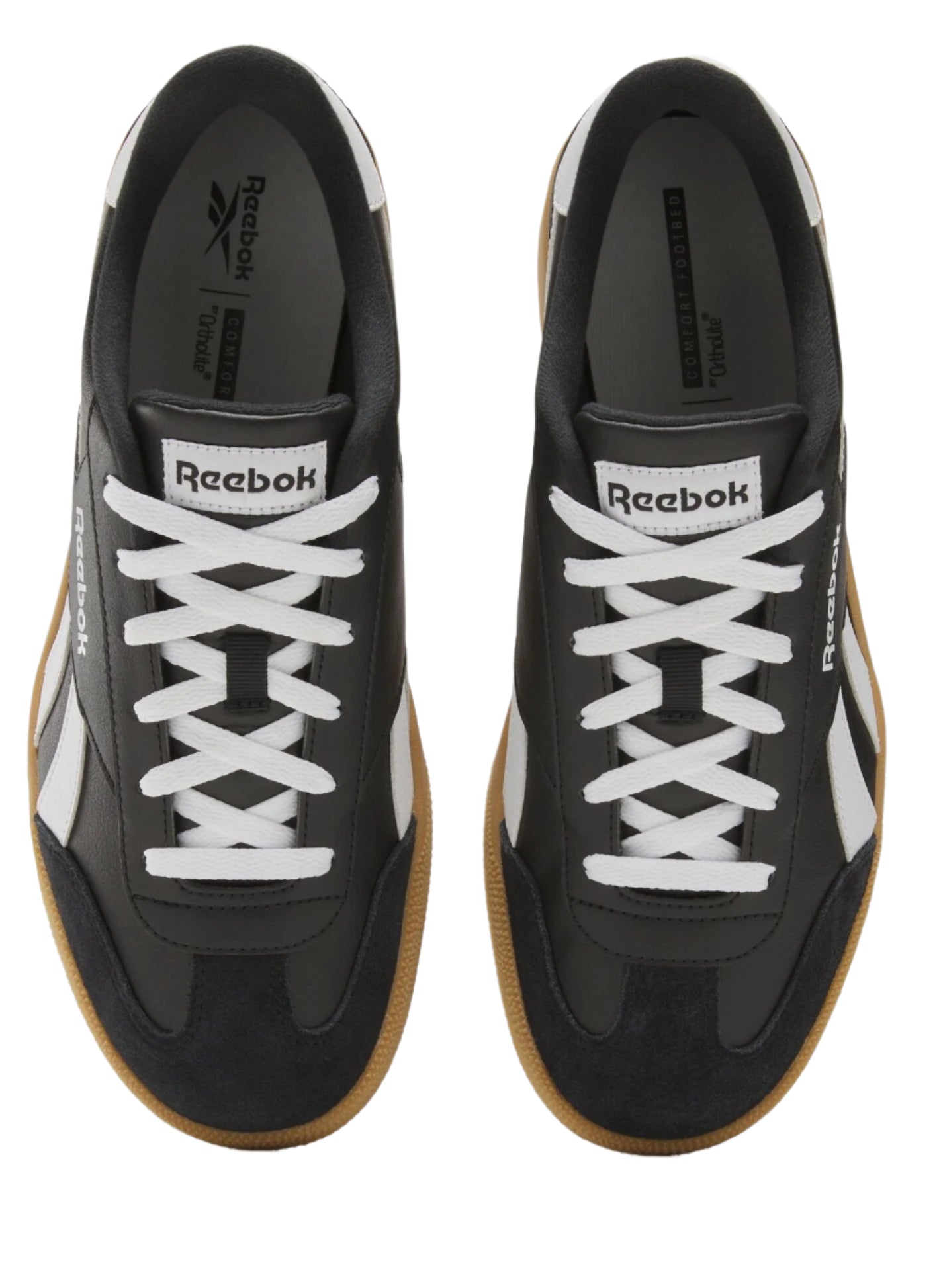 Overhead shot of black sneakers with white laces and logo, and brown soles.